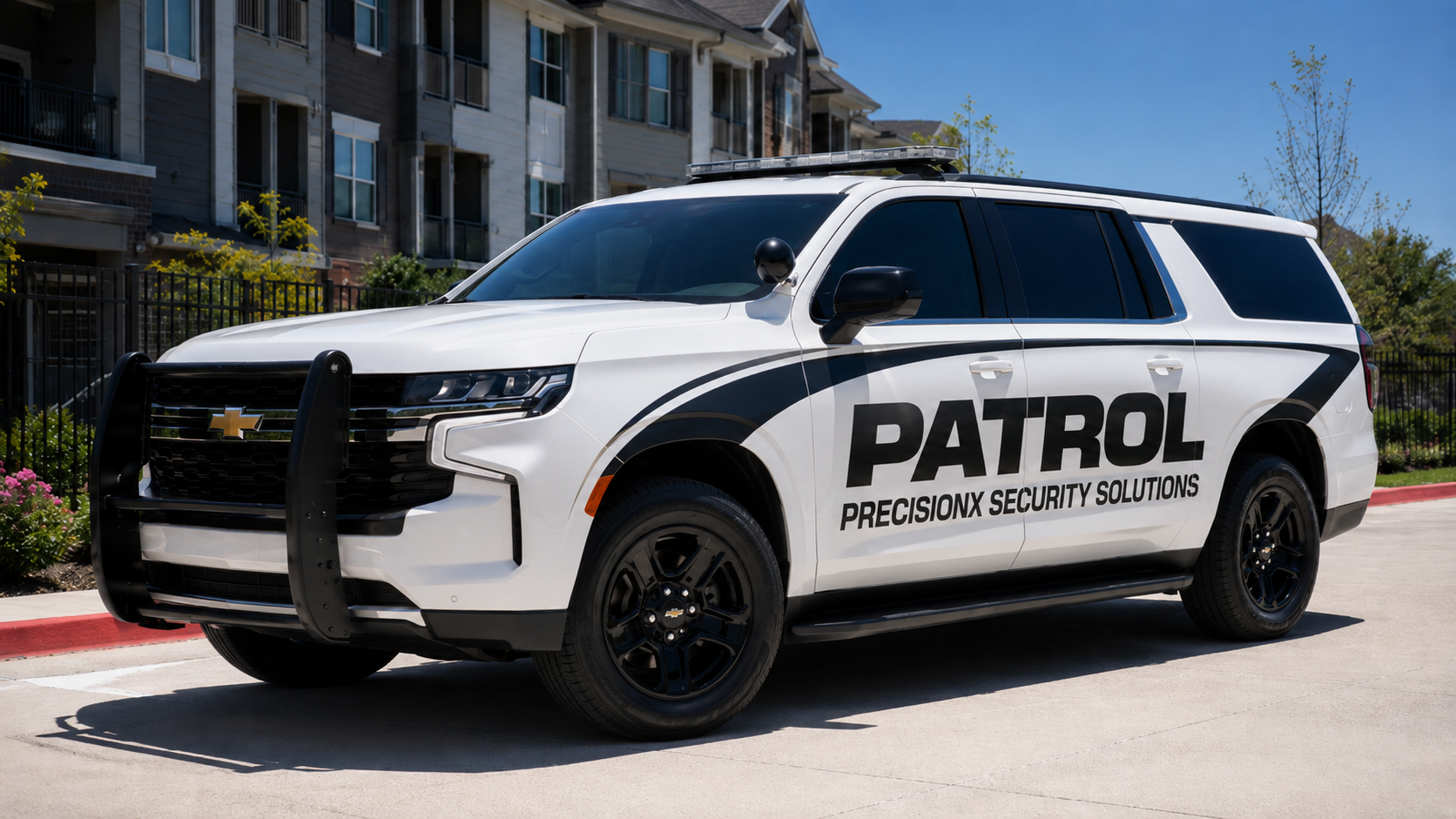 PrecisionX white marked patrol SUV parked at a facility entrance